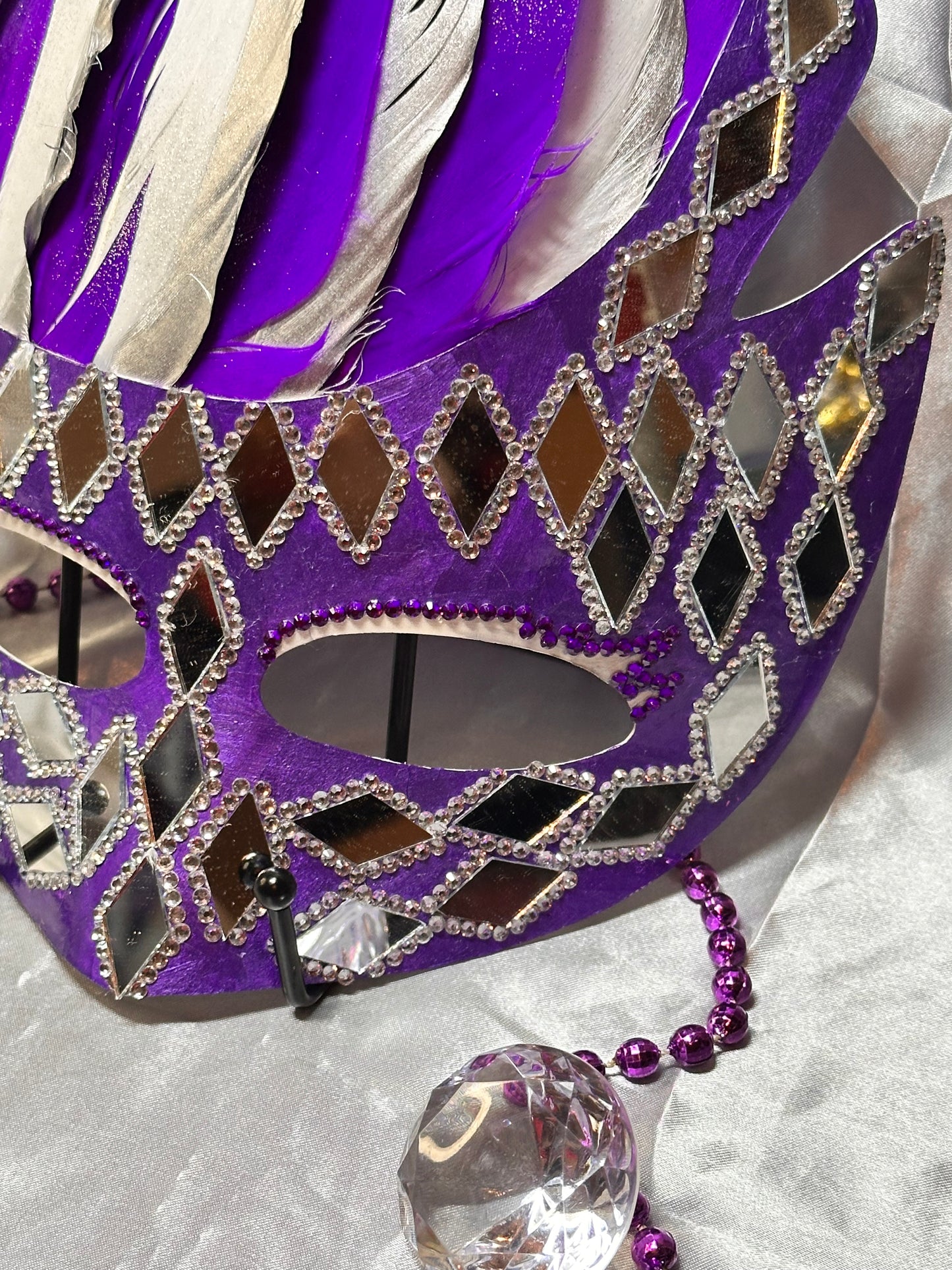 Feathered Mask: Diamond in the rough