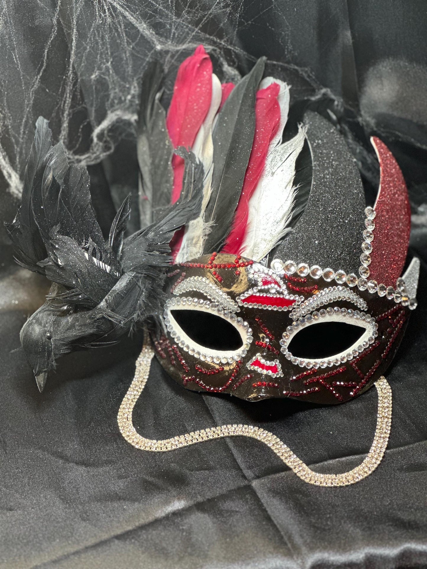 Feathered mask: The Witch’s Coven