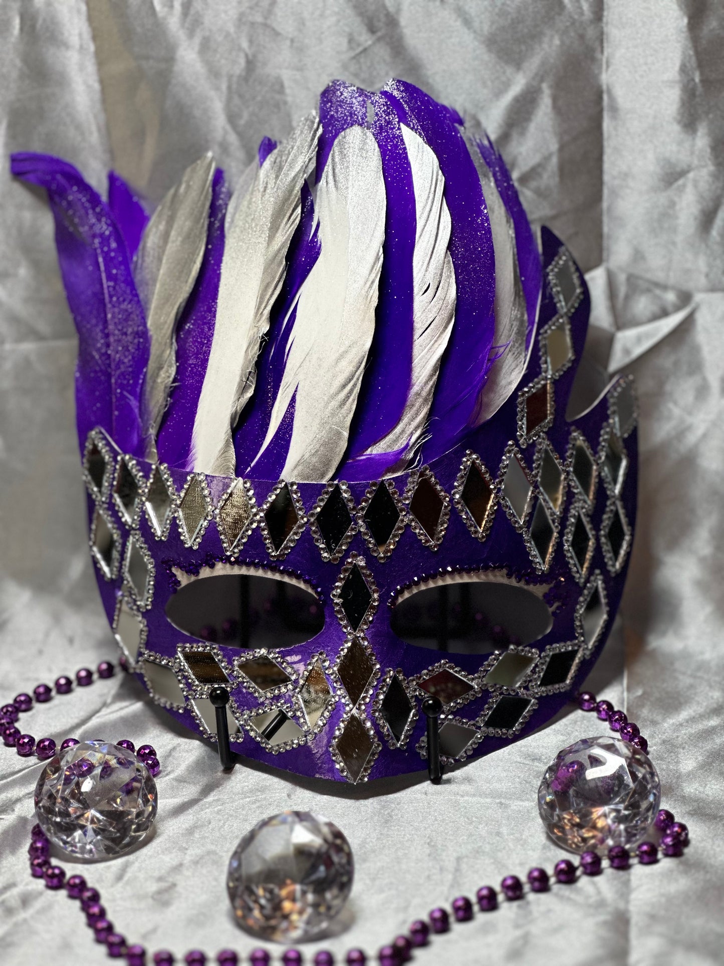 Feathered Mask: Diamond in the rough