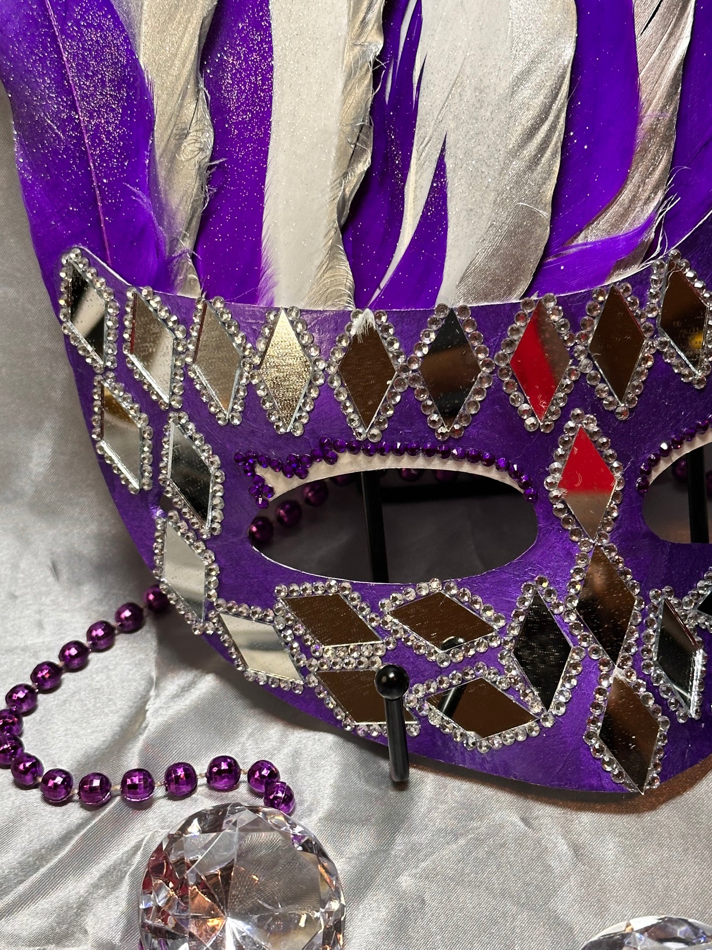 Feathered Mask: Diamond in the rough