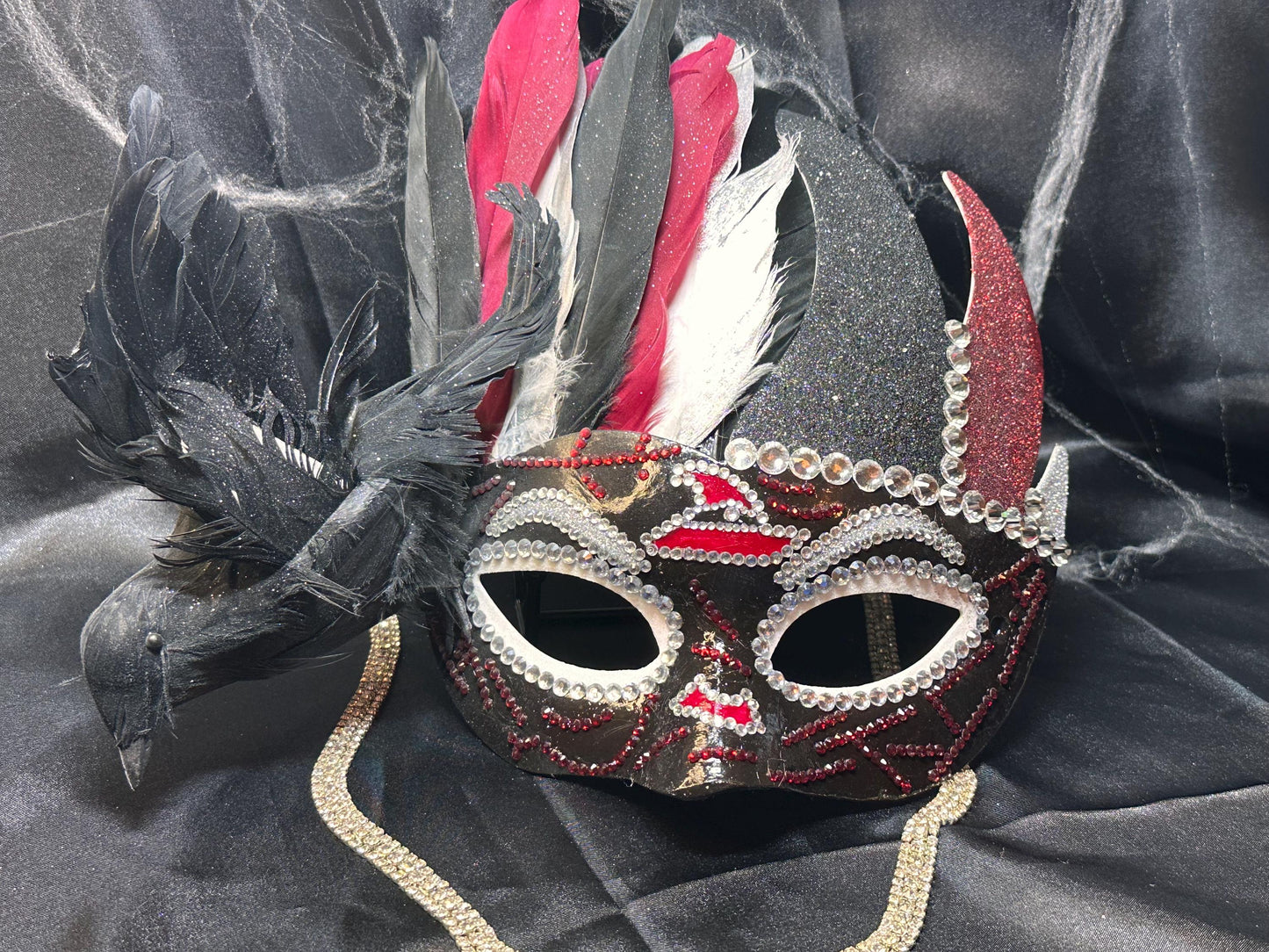 Feathered mask: The Witch’s Coven