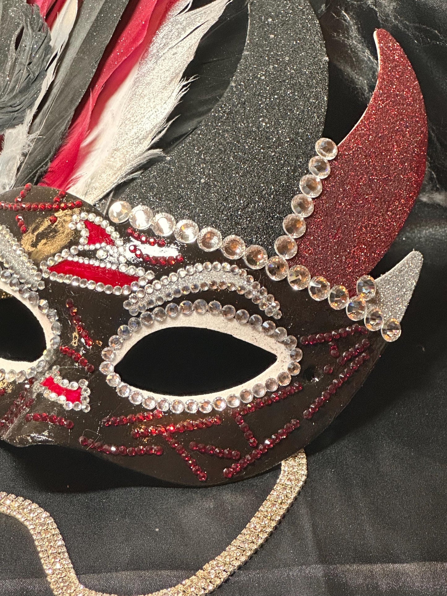 Feathered mask: The Witch’s Coven